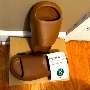 Yeezy slides Brand New! Never used. Sz 10 Men’s in Flax. StockX Authentic